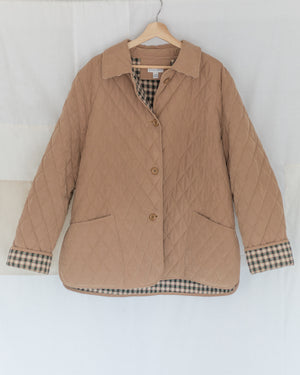 Vintage D'allaird oversized quilted jacket with button closure and two pockets. Women's size x-large.