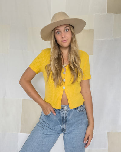 Vintage sunshine yellow cropped t-shirt with shell buttons. Women's size small.