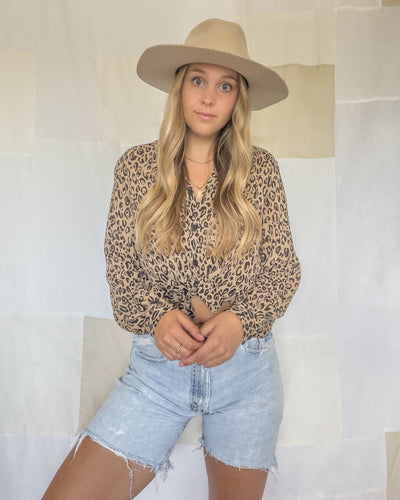 Vintage East West leopard print button-up blouse. Women's size medium.