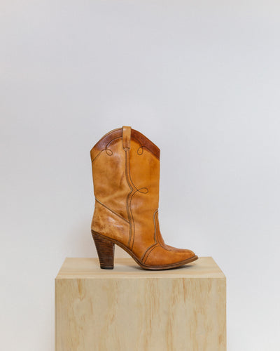 Vintage Manelli caramel brown cowboy boots. Made in Romania. Women's size 7 to 8.