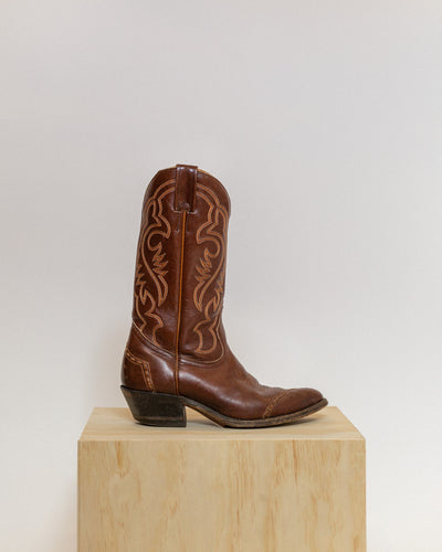 Vintage brown leather cowboy boots with orange and white stitching. Women's size 9 to 9.5.