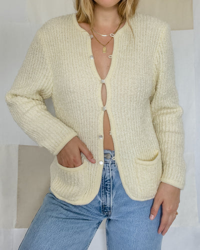 Vintage Bay Club cream cardigan with pearl style buttons and two front pockets. Women's size small.