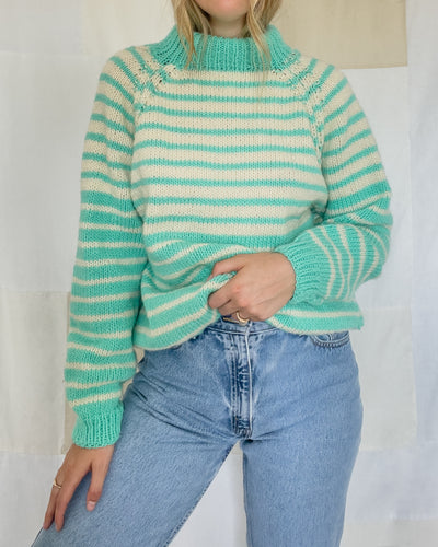 Vintage pastel green striped turtleneck knit sweater. Women's size medium.