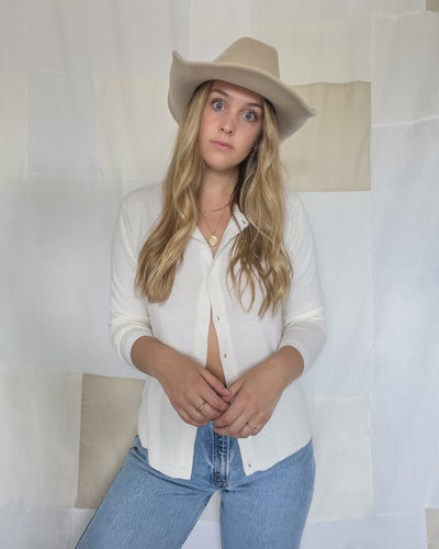 Vintage soft white button-up knit cardigan. Women's size medium.
